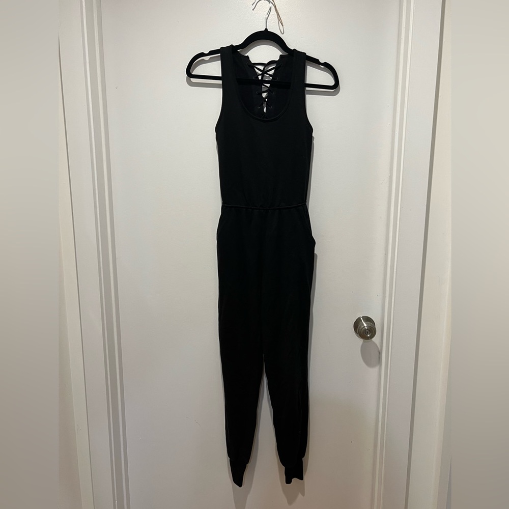 Sweatsuit jumpsuit with lace up back detail